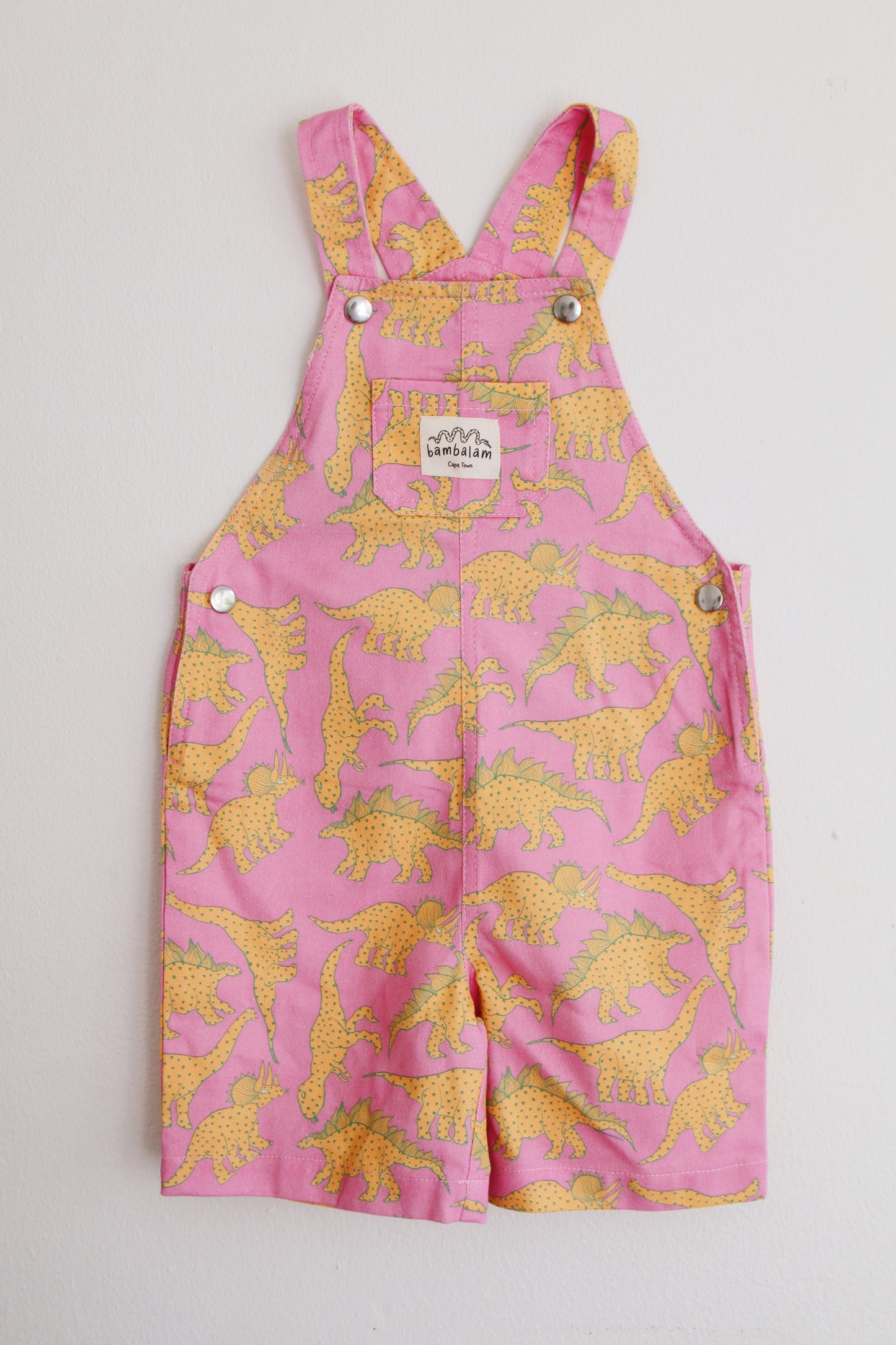 'Baby pink dinosaurs' Kids short dungaree