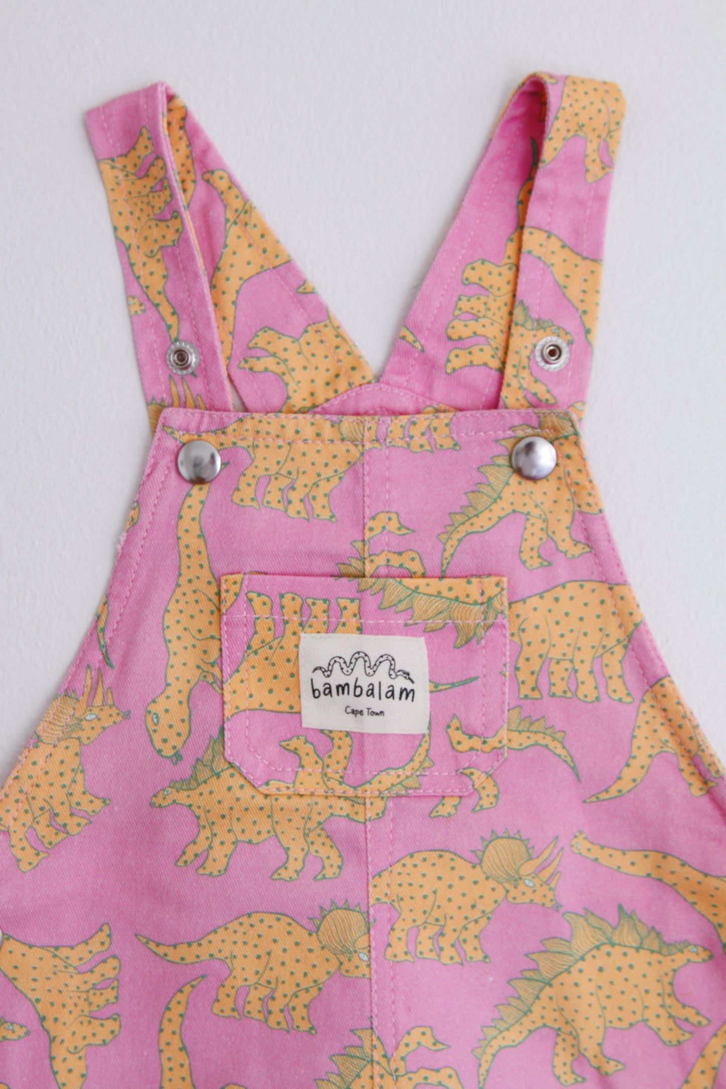 'Baby pink dinosaurs' Kids short dungaree