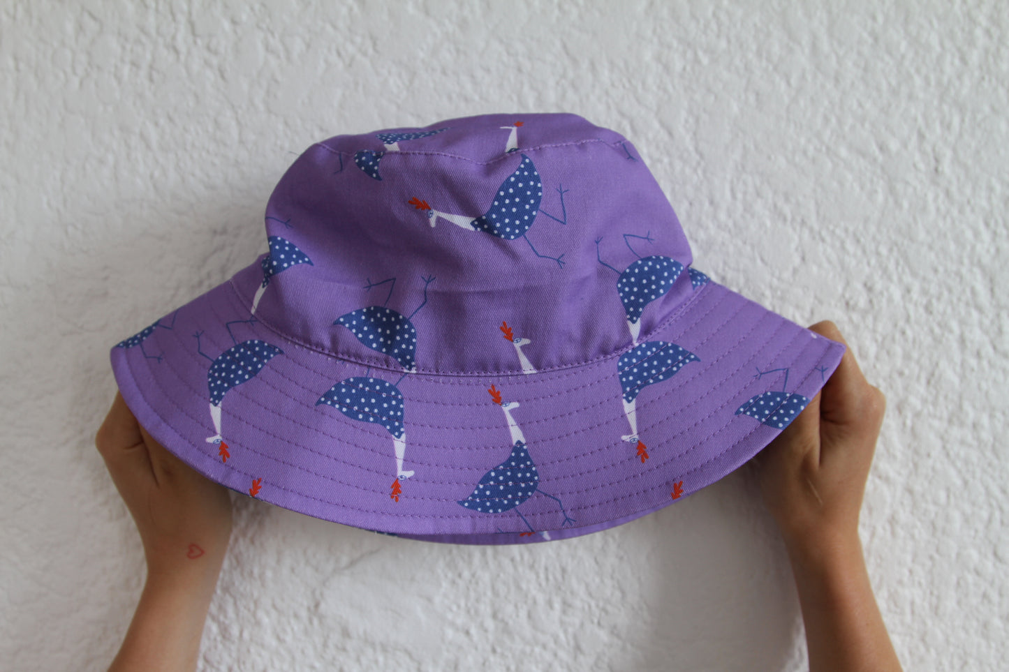 'Flirty fowl' hat