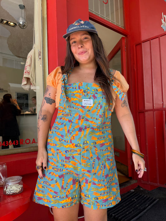 India wearing the Funky Fish short dungaree, size L